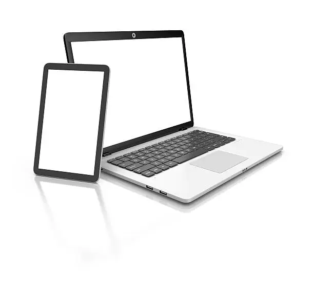 Photo of Modern Laptop and tablet isolated on white.