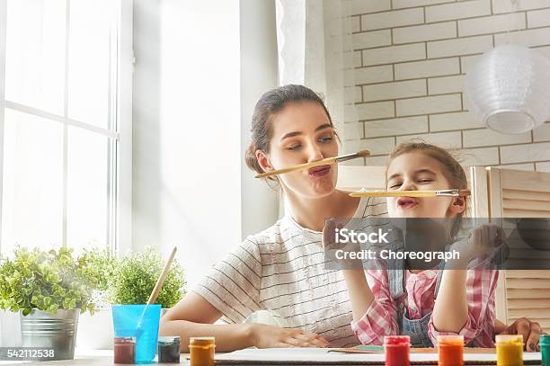 Mother And Daughter Together Paint Stock Photo - Download Image Now - Mother, Child, Fun