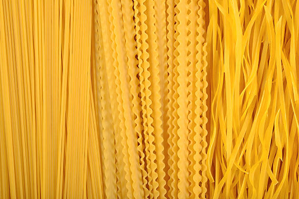 istock Assortment of uncooked Italian pasta as background 542170572