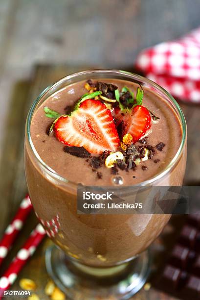 Chocolate Banana Smoothie With Strawberry Stock Photo - Download Image Now - Banana, Berry Fruit, Blended Drink