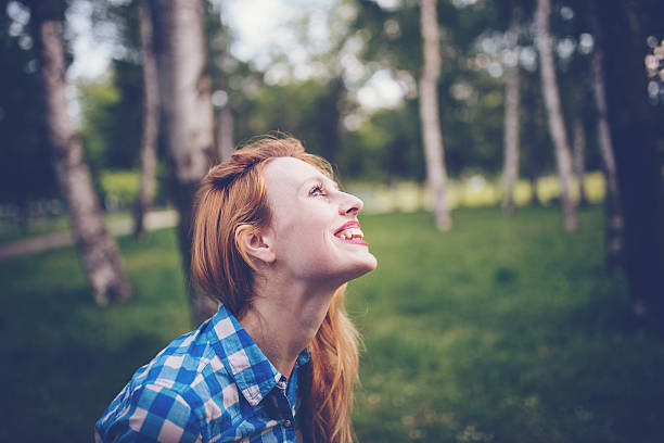 istock Beautiful  woman in a plaid shirt 542176486