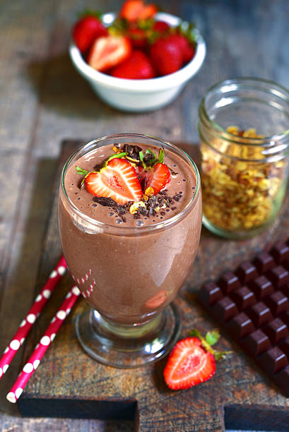 istock Chocolate banana smoothie with strawberry. 542176604