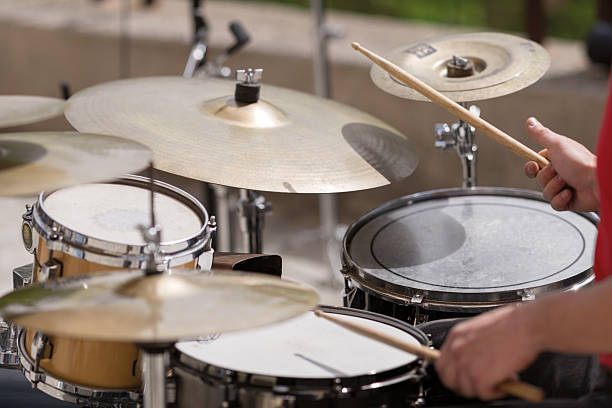 istock drum kit playing on street by street musician 542177302
