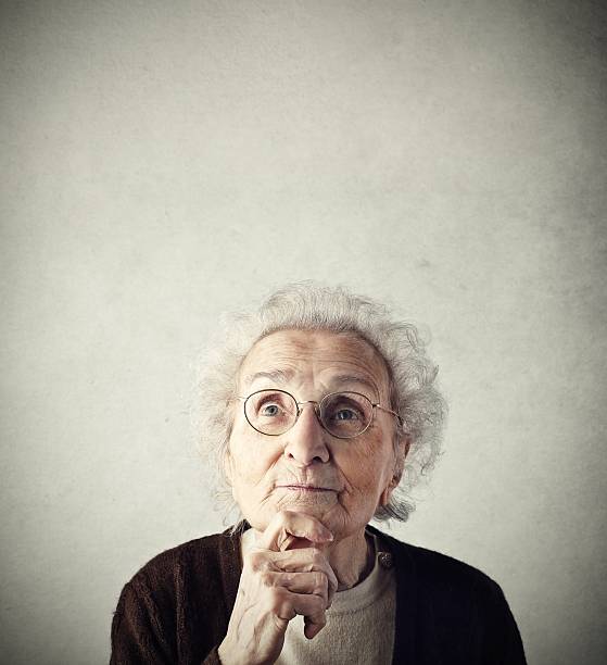 istock Little old woman thinking 542177422
