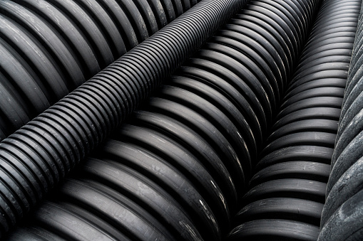 Stacked sewage pipes in factory