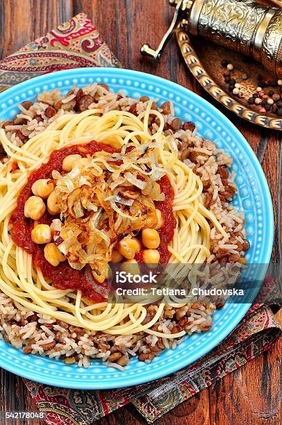 Kushari Egyptian Dish Of Lentils Rice Pasta Chickpeas Stock Photo - Download Image Now