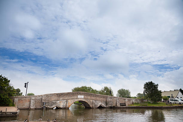istock Potter Heigham low bridge on river Thurne Norfolk Broads England 542179388