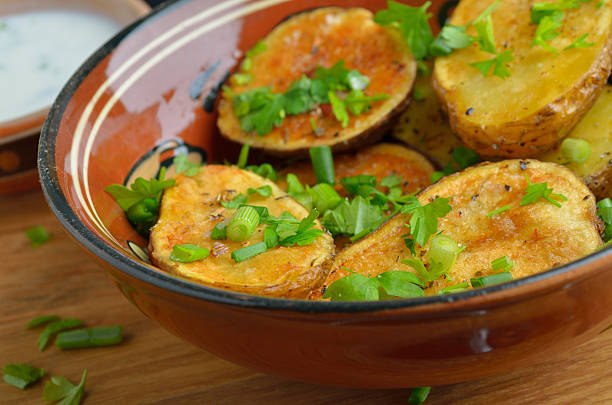 istock oven baked potatoes 542181350
