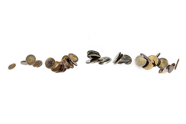 istock Argentine coins falling, isolated on white background 542182196