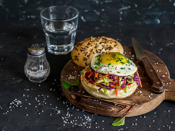 istock Homemade burger with fried egg and coleslaw 542183948