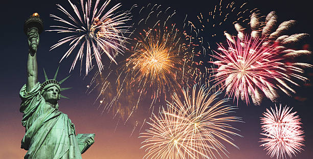 istock fireworks behind the statue of liberty 542184864