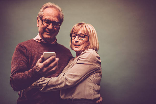 istock Senior couple taking selfie 542185058