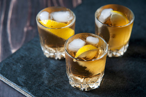 istock Alcohol cocktail with brandy, whiskey, lemon and ice 542186684