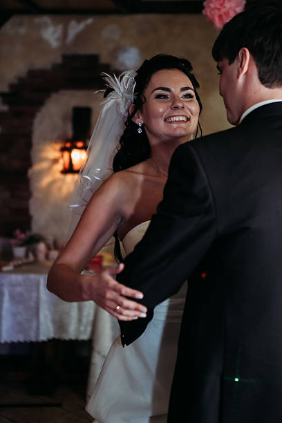 istock beautiful young couple stand on background cafe 542188590