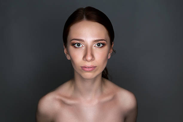 istock Brunette woman, nude shoulders 542189074