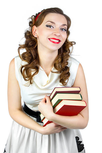 istock Young woman with books 542189166