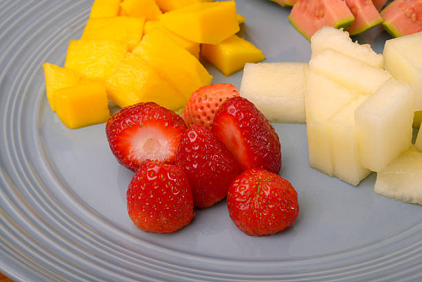 istock Assorted Fruits - Mango, Strawberry, Melon and Guava 542189204
