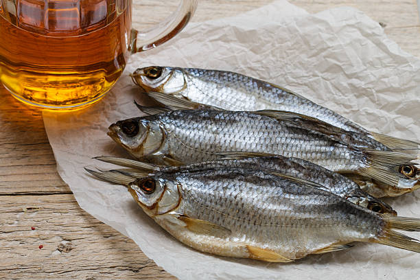 istock Dried fish and beer on the table. Traditional Russian appetizer 542190586