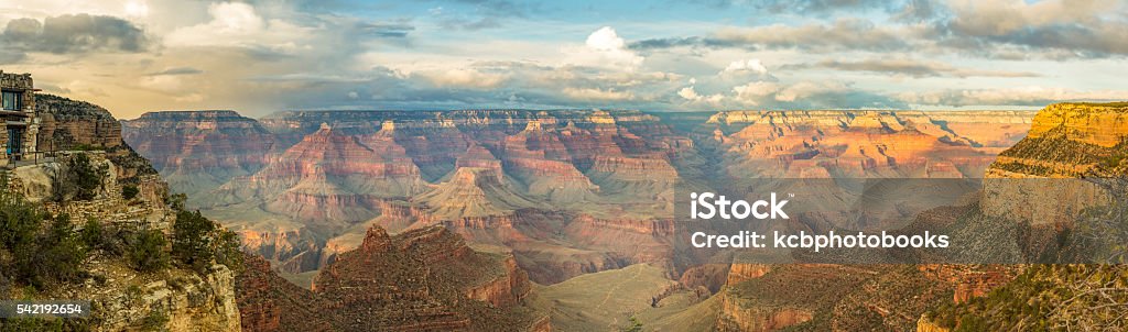 Grand Canyon Panorama at Sunset Stormy afternoon sunset at the Grand Canyon with Look Out studio to the left Arizona Stock Photo