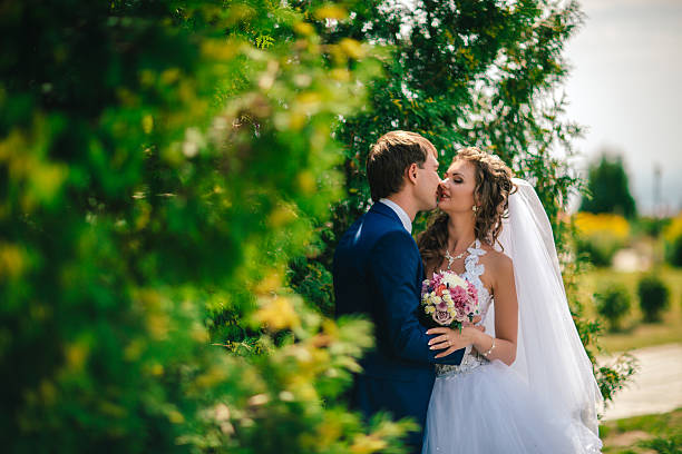 istock beautiful young couple posing  on a background of windows 542193716