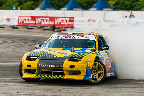 Lviv, Ukraine - June 4, 2016: Unknown rider on the car brand Nissan overcomes the track in the championship of Ukraine drifting in Lviv, Ukraine.