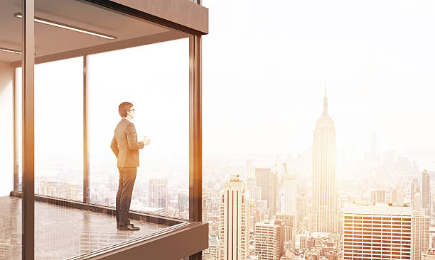 istock Businessman on balcony toning 542194080