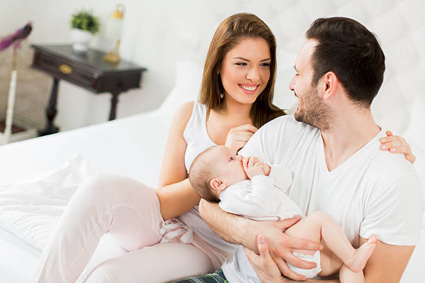 istock Happy family on the bed 542194986