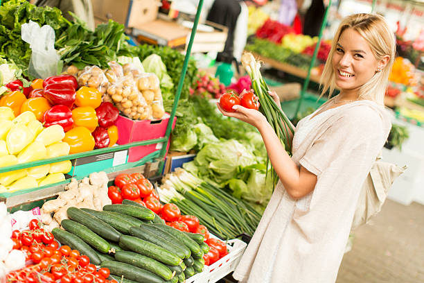 istock Woman at market 542195584