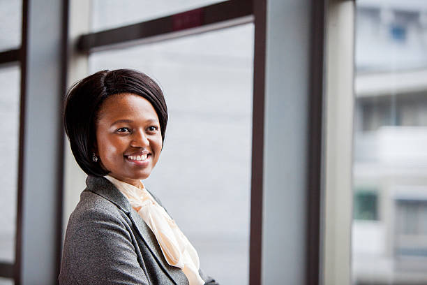 istock African female executive smiling 542196426