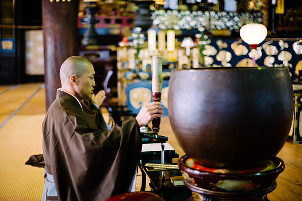 Afternoon prayer in Chijon-ji Buddhist Shrine in Kyoto. Location: Kyoto, Japan