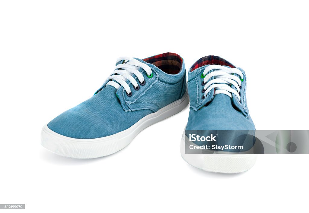 Men's shoes of cloth of blue color Men's shoes of cloth of blue color on a white background. With clipping path Arts Culture and Entertainment Stock Photo