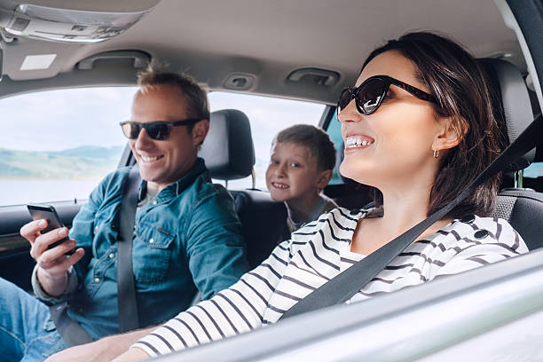 istock Happy family riding in a car 542199580