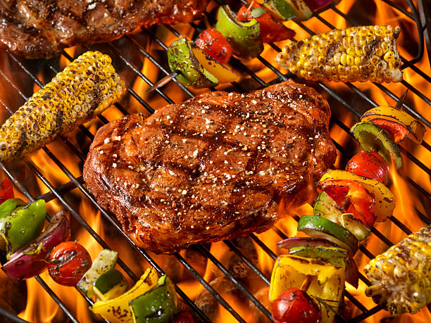 istock BBQ Rib Eye Steaks with Corn and Veggie Kabobs 542200886