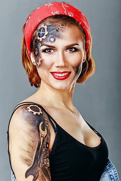 istock Girl mechanic with face art. 542201550