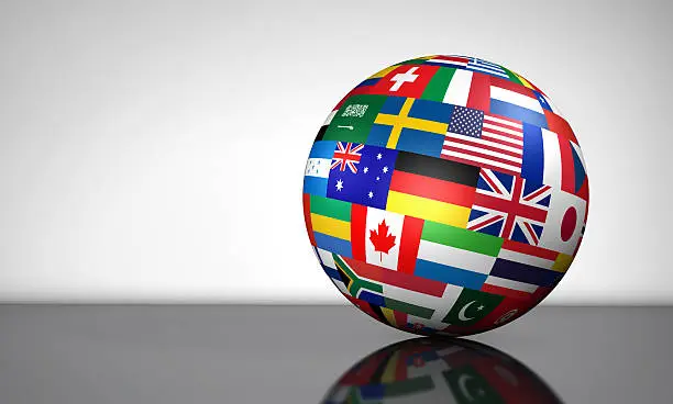 Flags of the world on a globe for international business, school, travel services and global management concept 3d illustration on white background.