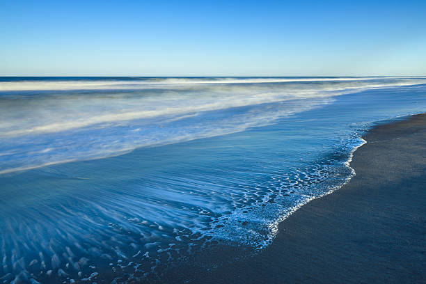 Beach in Late Afternoon Sun - Long Exposure stock photo
