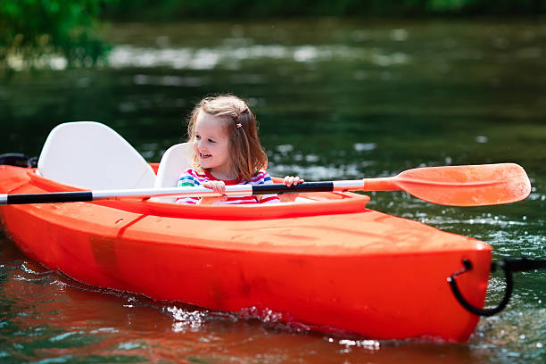 istock Little girl in a kayak 542203310