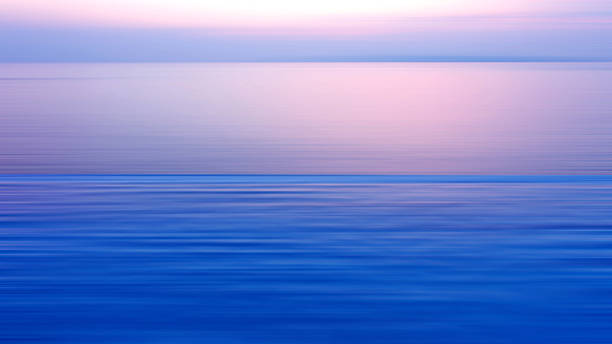 istock Motion blurred background of refraction in the sea 542208314