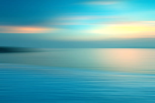 istock Motion blurred background of refraction in the sea 542208442