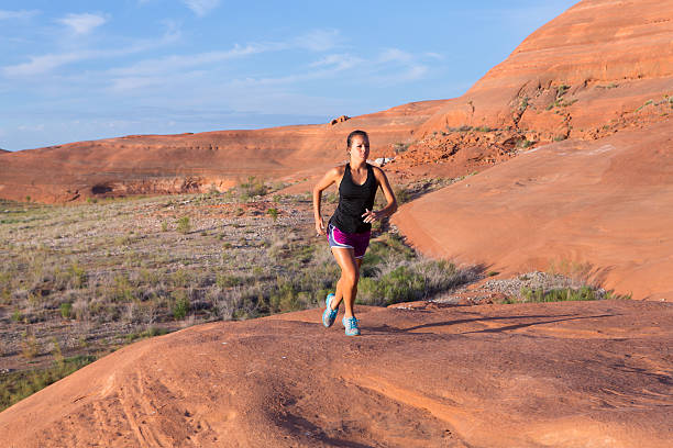 istock Girl on Desert Sunrise Run 542209632