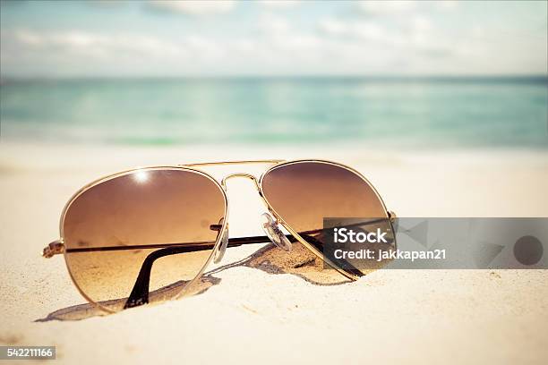 Sunglasses Stock Photo - Download Image Now - Sunglasses, Beach, Sand