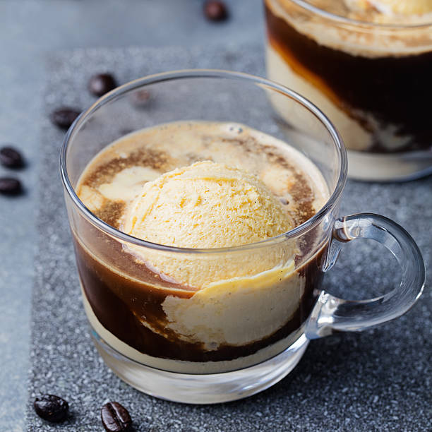 istock Affogato coffee with ice cream on glass cup Grey background 542212200