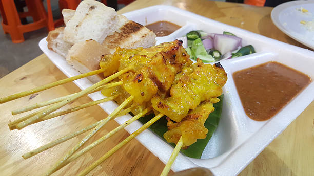 istock Asian satay, Pork with asian herb grilled with stick 542212204