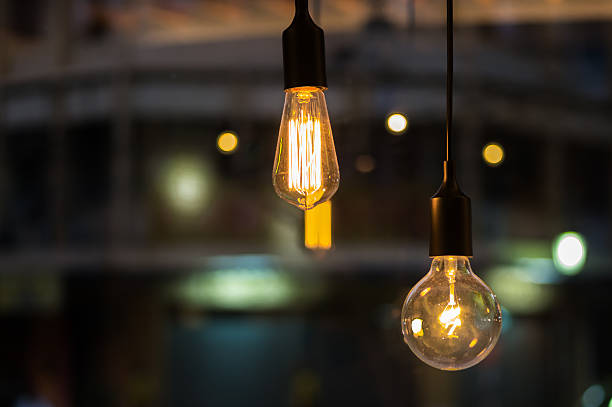 istock Vintage light bulb light in the dark 542213124
