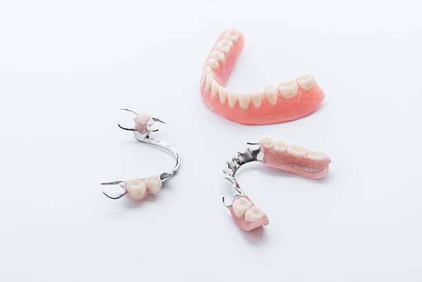 istock Set of dentures on white background 542214046