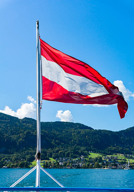 istock Austria flag waving during cruise on Wolfgangsee lake 542215842