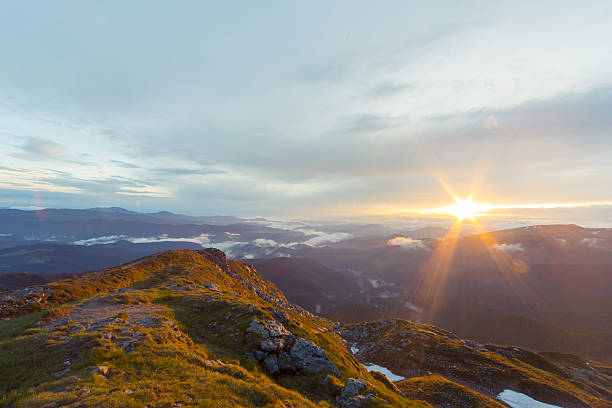 istock Sunrise in the mountains in summer. 542218278