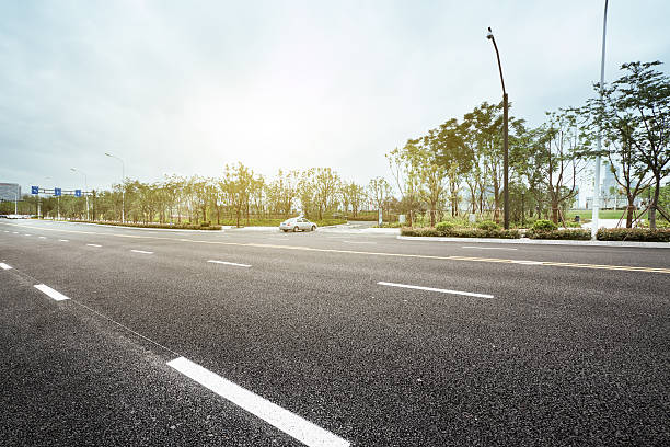 istock empty rural asphalt road at sunrise 542285324