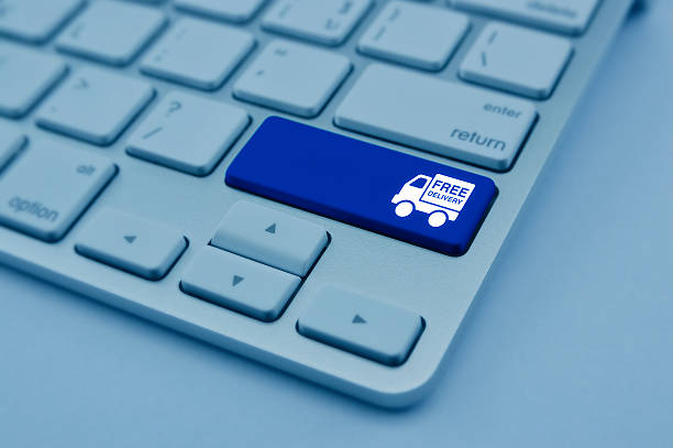 istock Free delivery truck icon on computer keyboard button, Transportation concept 542287494