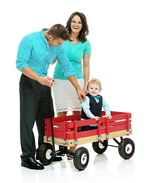 istock Happy couple playing with their baby 542291146
